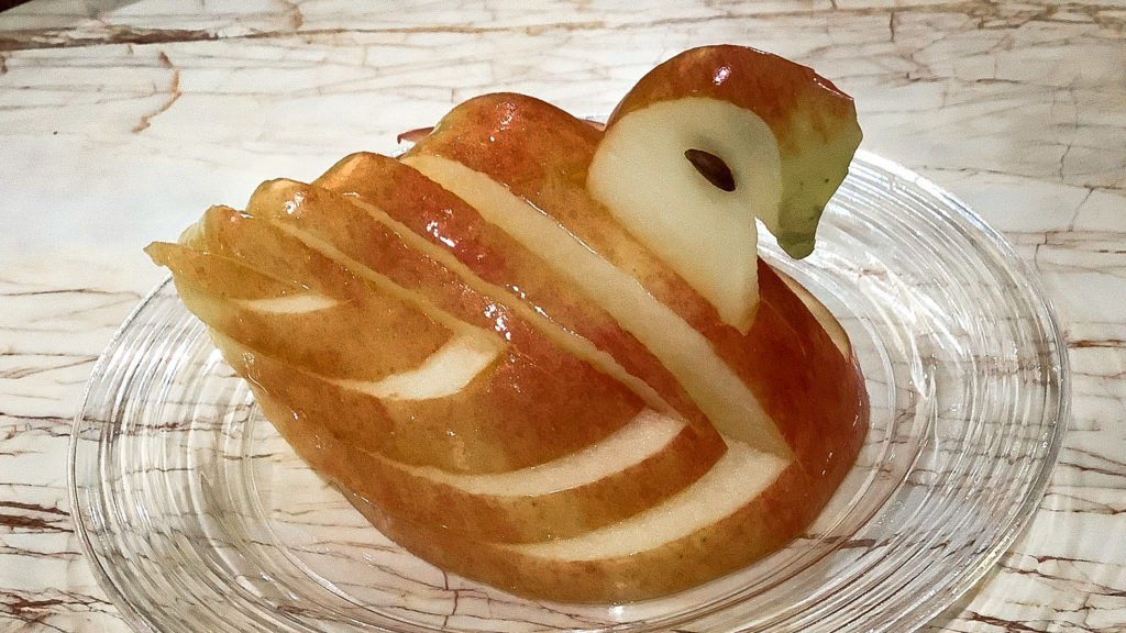 Bird centerpiece carved from an apple