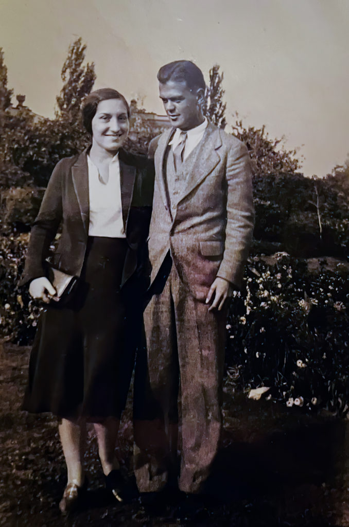 Black and white photo of Anne and Moses Mayov as a young couple standing next to each other