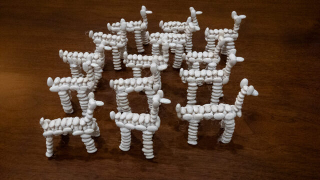 A herd of llamas scattered among the guests as they arrived A herd of llamas made from lima beans
